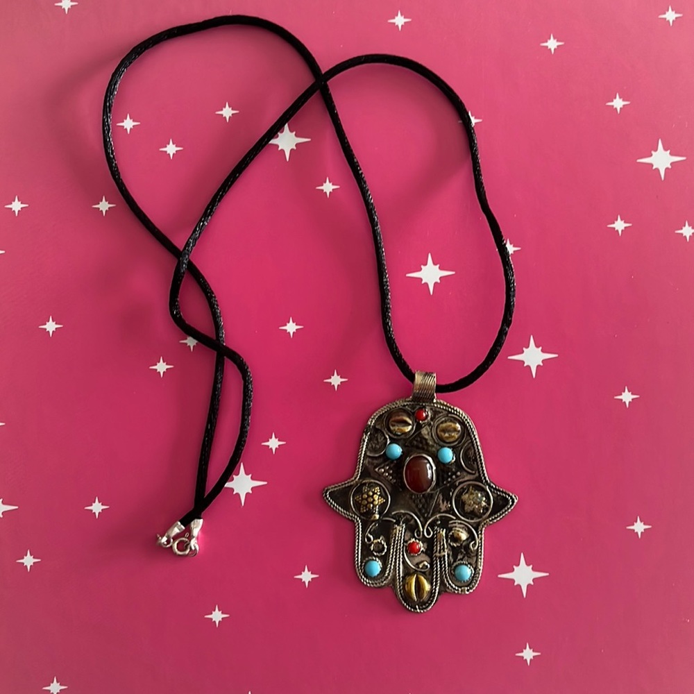 Hamsa on a silk rope with silver clasp